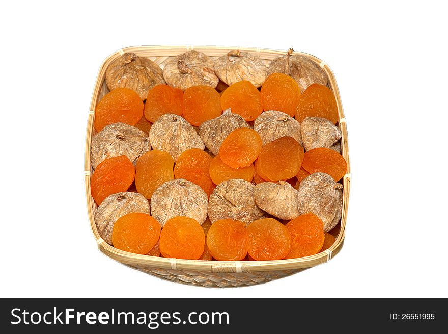 Dried apricots and figs on a white background. Dried apricots and figs on a white background