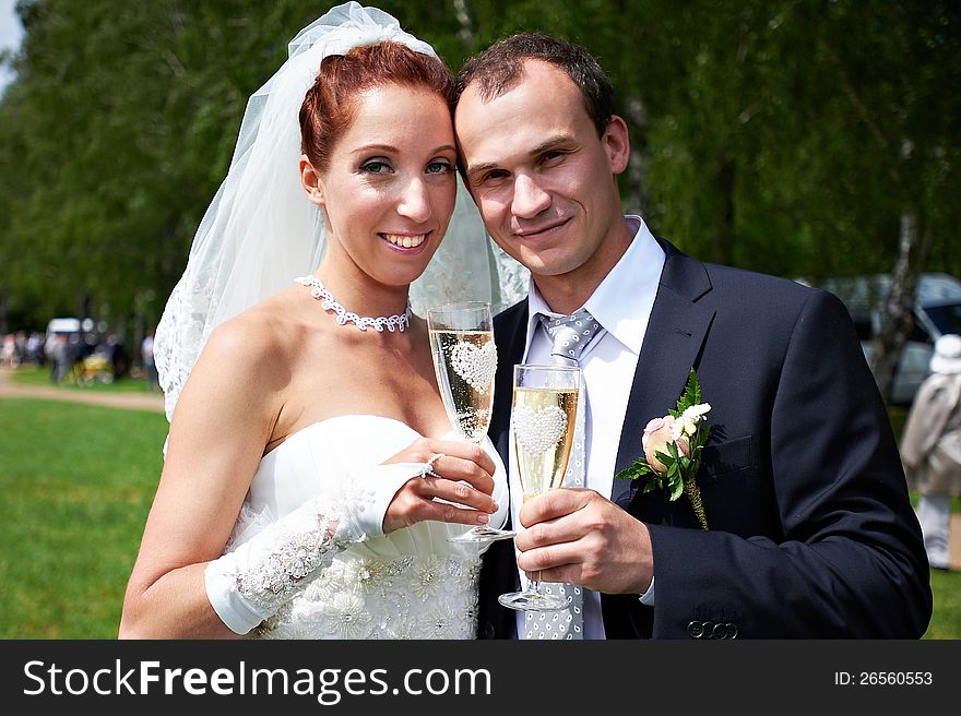 Bride And Groom With Champagne Glasses