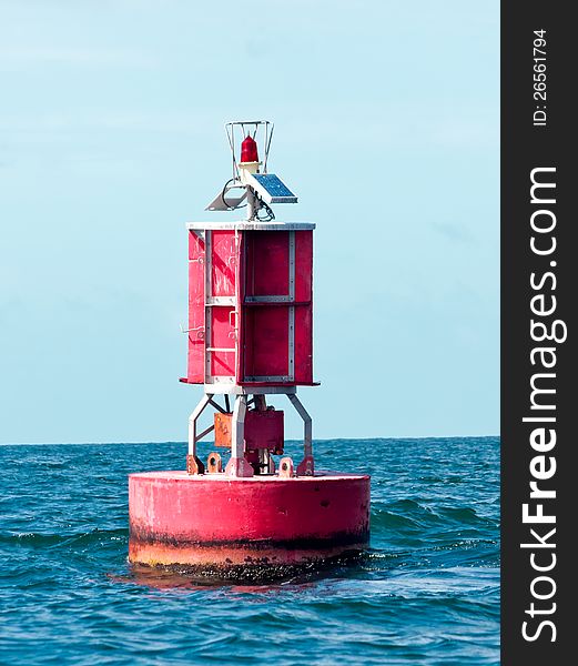 Floating Red Buoy At Mid Of Sea