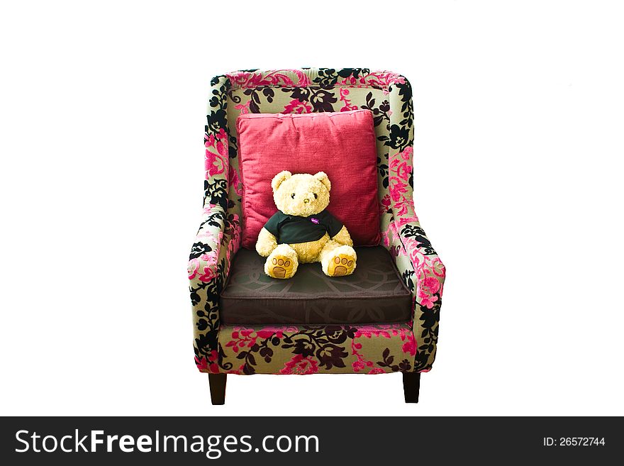 Teddy bear  on the couch.