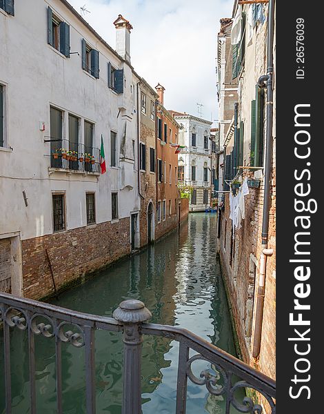 View of the water channel in the Italian Venice. View of the water channel in the Italian Venice