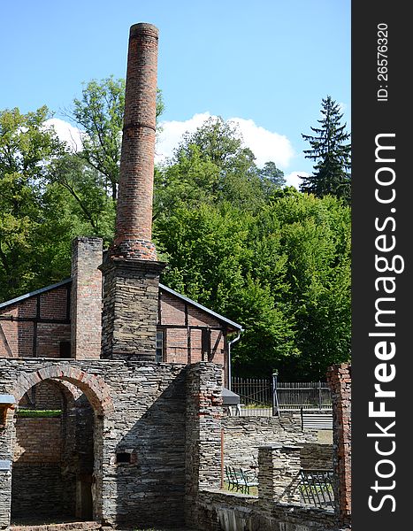 Ruin with chimney of a old iron foundry