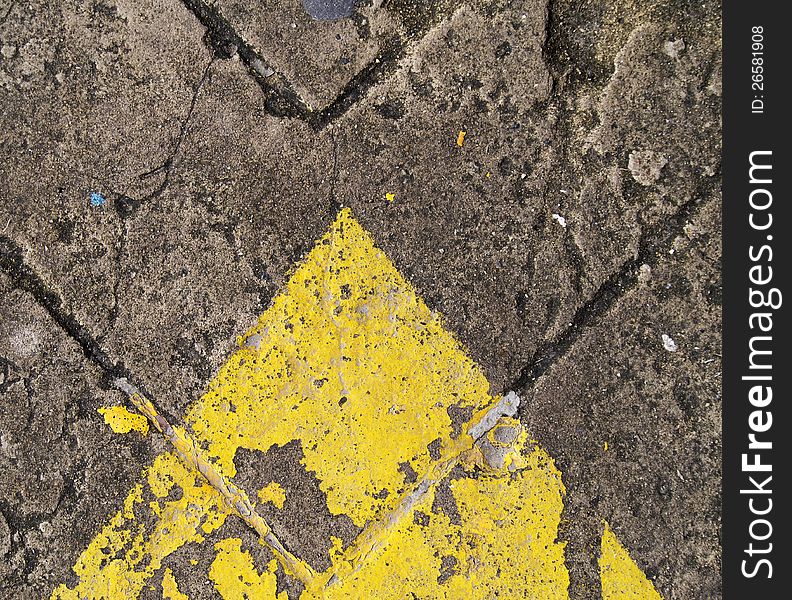 Forwarded yellow arrow on the road. Forwarded yellow arrow on the road