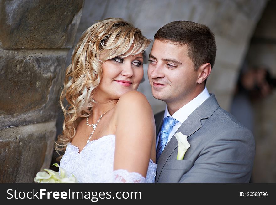 Bride and groom look at each other on wedding day