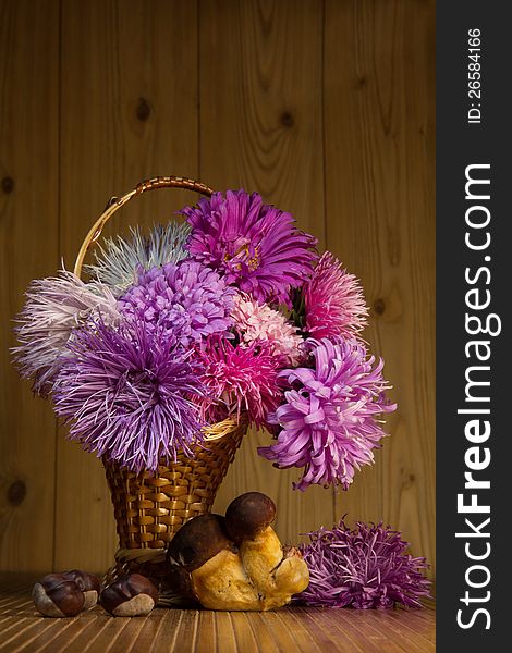 Bouquet of autumn flowers and mushrooms. Bouquet of autumn flowers and mushrooms