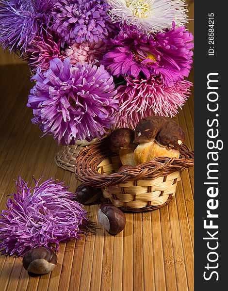 Bouquet of autumn flowers and mushrooms. Bouquet of autumn flowers and mushrooms
