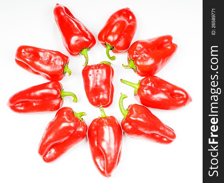 Star made of peppers  on white background. Star made of peppers  on white background