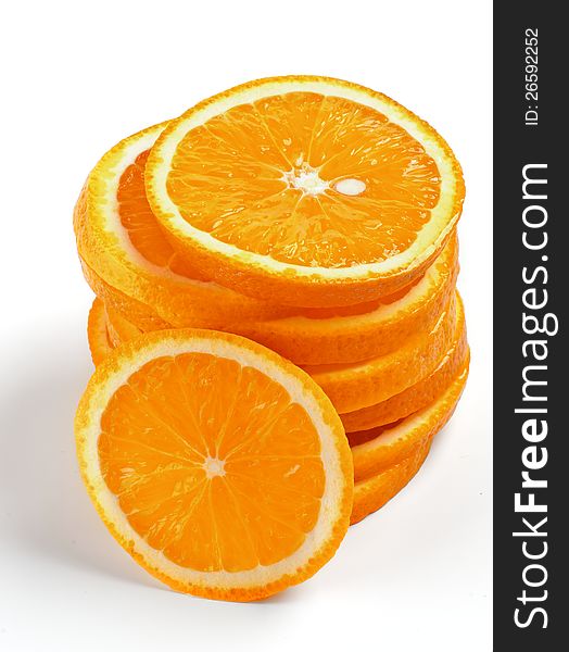 Stack of Fresh Ripe Orange Lobules  on white background. Stack of Fresh Ripe Orange Lobules  on white background