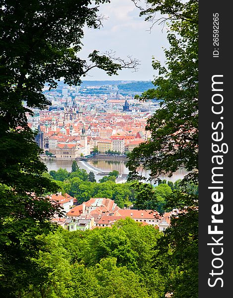 Beautiful Prague seen through trees on a Petrin Hill