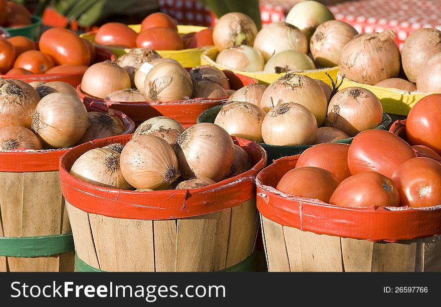 Jean-Talon market in Montreal with some onions and tomatoes. Jean-Talon market in Montreal with some onions and tomatoes