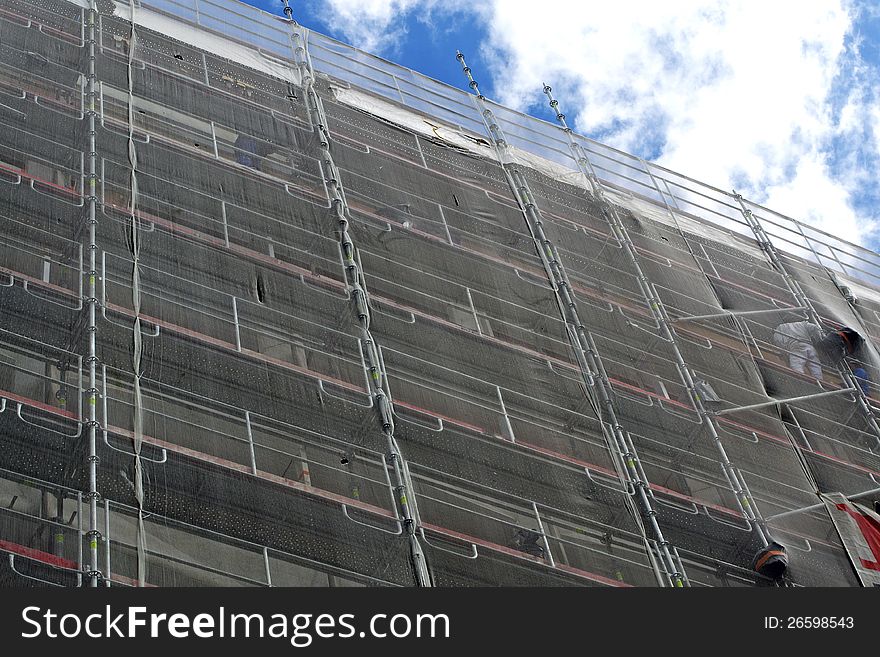 Scaffolding On A Building Wall