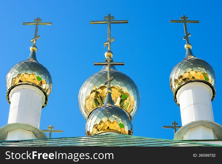 Golden domes against the blue sky. Golden domes against the blue sky.