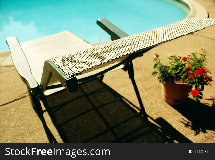 Lounge chair by the pool. Lounge chair by the pool