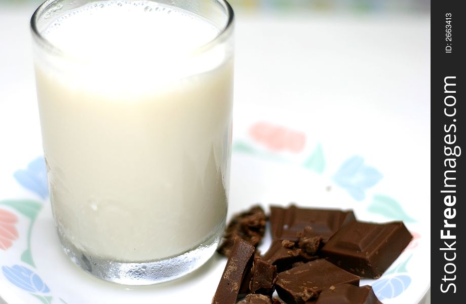 Milk and chocolate in a white background