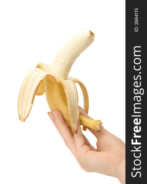 Banana in hand close up on white background