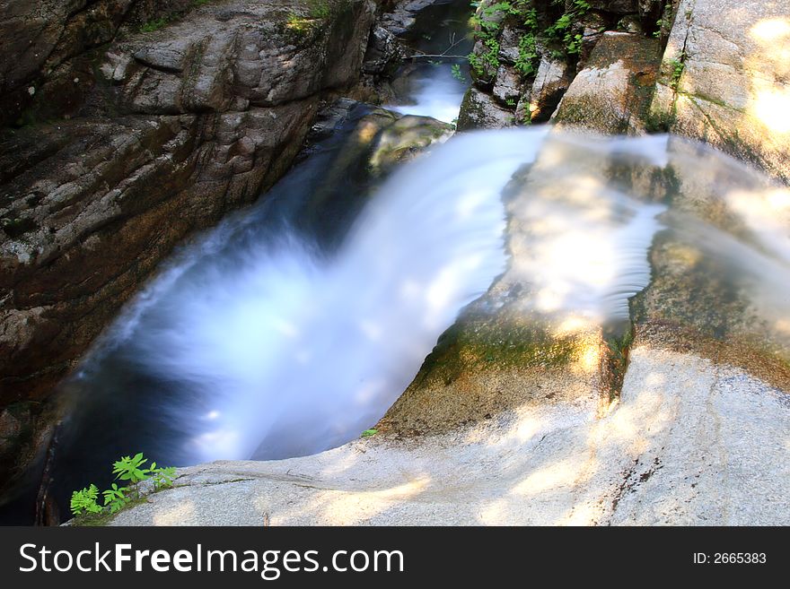 Looking down on the Sabbaday Falls in the White Mountains of New Hampshire. Looking down on the Sabbaday Falls in the White Mountains of New Hampshire