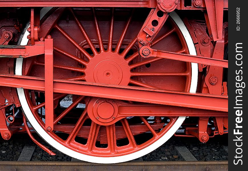 Red steam engine wheel and push rod. Red steam engine wheel and push rod