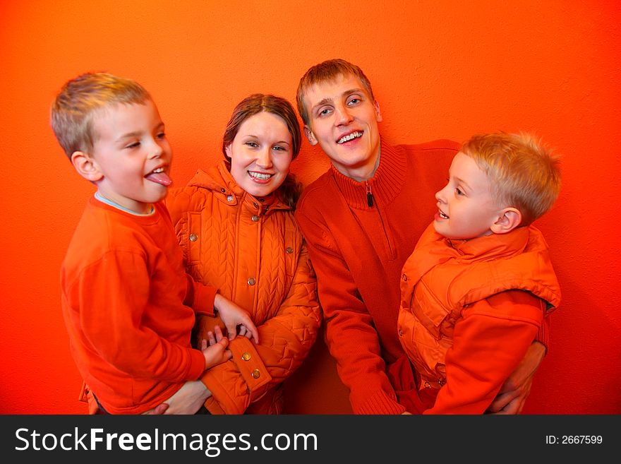 Family together on an red background. Family together on an red background