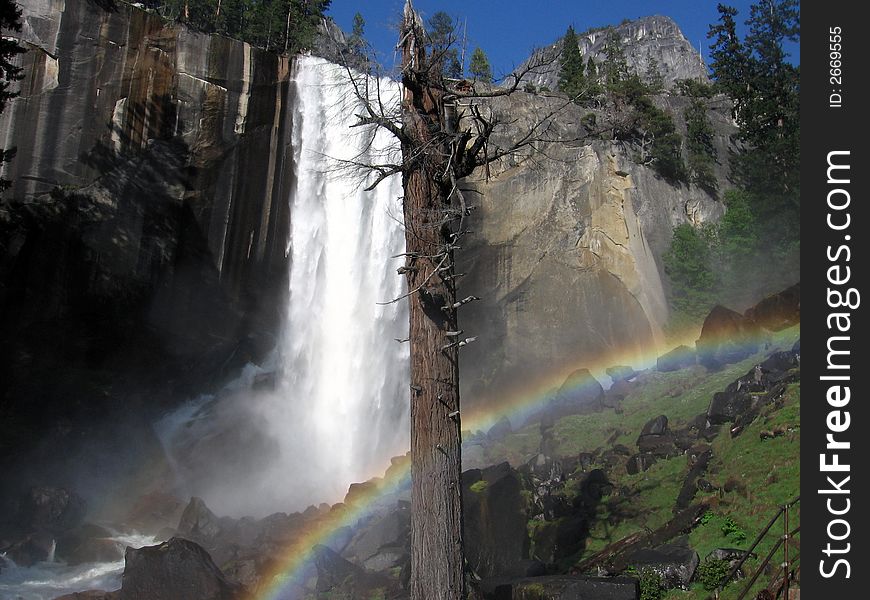 A waterfall in Yosemite National Park on the way to the top of Half Dome. A waterfall in Yosemite National Park on the way to the top of Half Dome