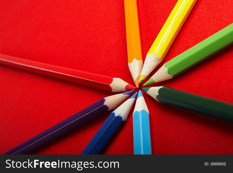 A Circle of Colored Pencils on Red Background - check my gallery for more pictures. A Circle of Colored Pencils on Red Background - check my gallery for more pictures
