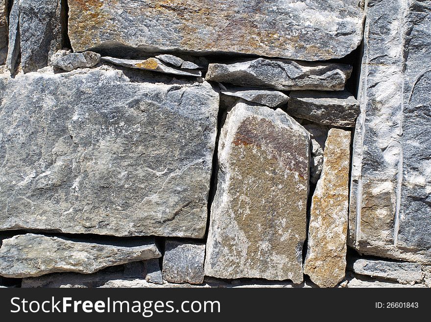 A Stone granit wall, Granit of Corsica. A Stone granit wall, Granit of Corsica