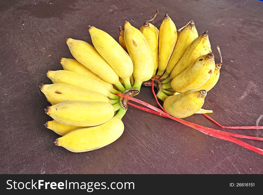 Banana on wooden table, tropical fruit