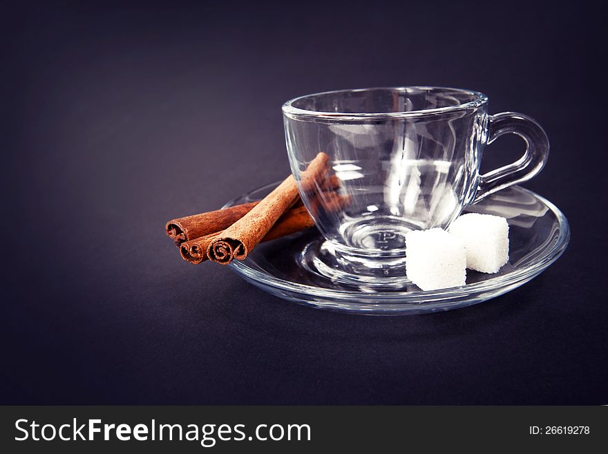 Glass coffee cup on dark background