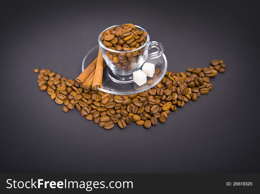 Glass  cup with fresh coffee beans