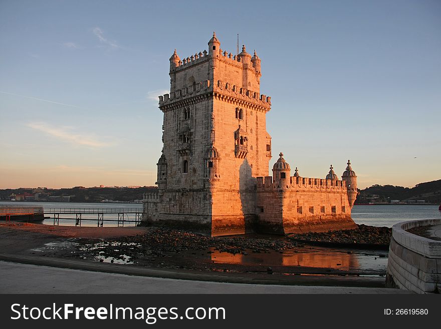 Ancient Belem Tower at sunset. Ancient Belem Tower at sunset