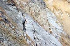 Crack In The Glacier On The Mountain Slope Royalty Free Stock Photos