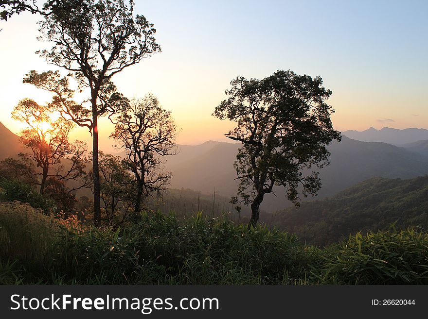 Photo is locatedPhoto is located Conquer White elephant Mountain, Which is the highest peak of the Thong Pha Phum National Park, with a height of 1249 meters from sea level, with a sparse forest interspersed with meadow, look at the direction 360 degrees, there is a beautiful ridge,Province Kanchanaburi, in Thailand. Photo is locatedPhoto is located Conquer White elephant Mountain, Which is the highest peak of the Thong Pha Phum National Park, with a height of 1249 meters from sea level, with a sparse forest interspersed with meadow, look at the direction 360 degrees, there is a beautiful ridge,Province Kanchanaburi, in Thailand