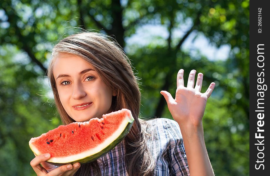 Young woman with watermelon outdoors. Young woman with watermelon outdoors