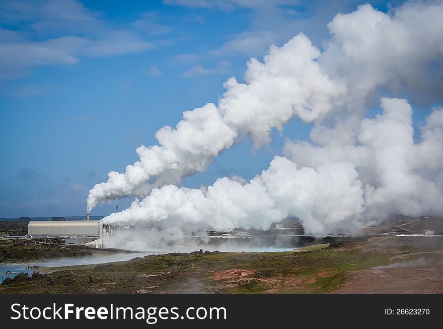 Smoking factory field polluting the air, Iceland