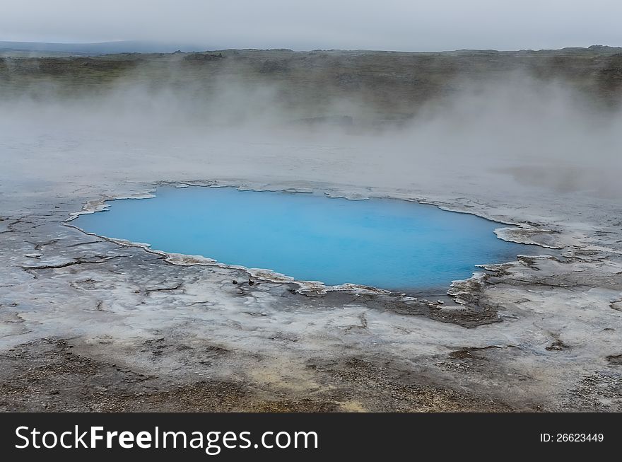 Detail of blue geothermal pond in Hveravellir