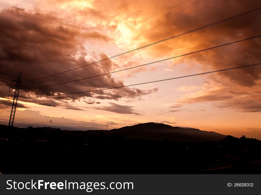 Silhouettes Of The Power Lines