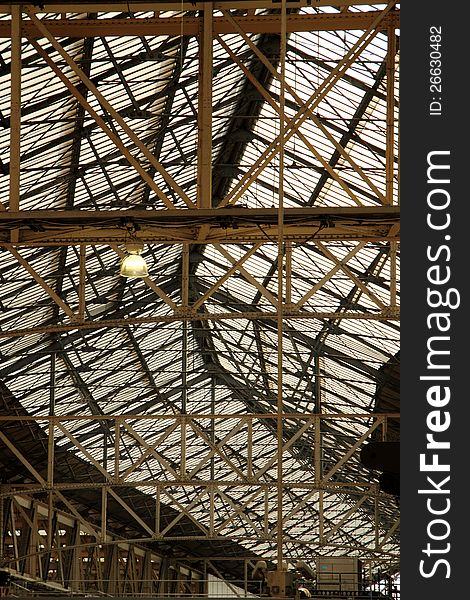 Interior of industrial glass roof and associated framework