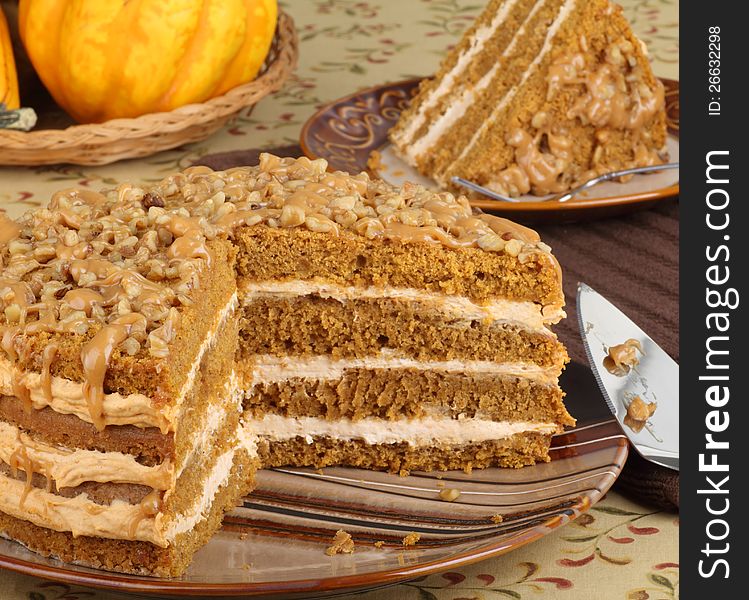 Sliced pumpkin layer cake on a plate