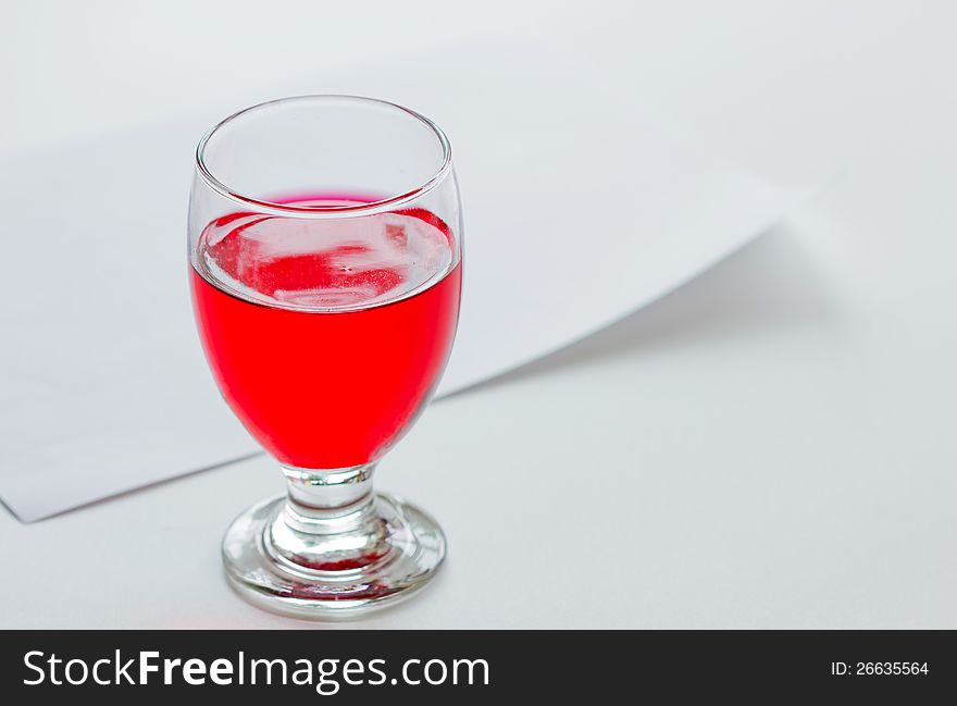 Red Color, Soft Drink In Glass With Paper Backgrou