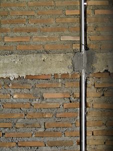 Brick Wall With Metal Pipe. Royalty Free Stock Photography Brick Wall With Metal Pipe. Royalty Free Stock Photography