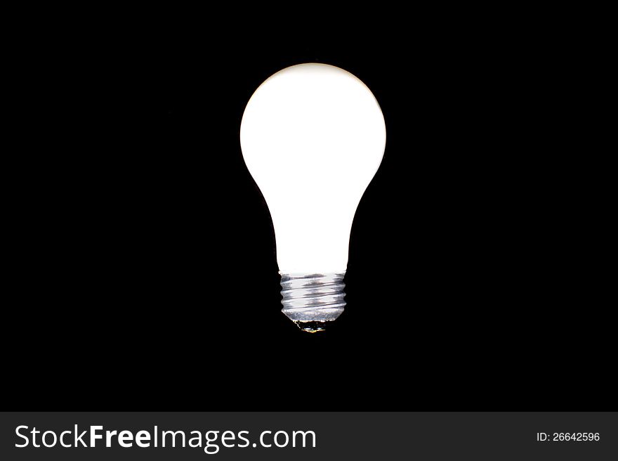 Bright light bulb isolated on black background. Bright light bulb isolated on black background