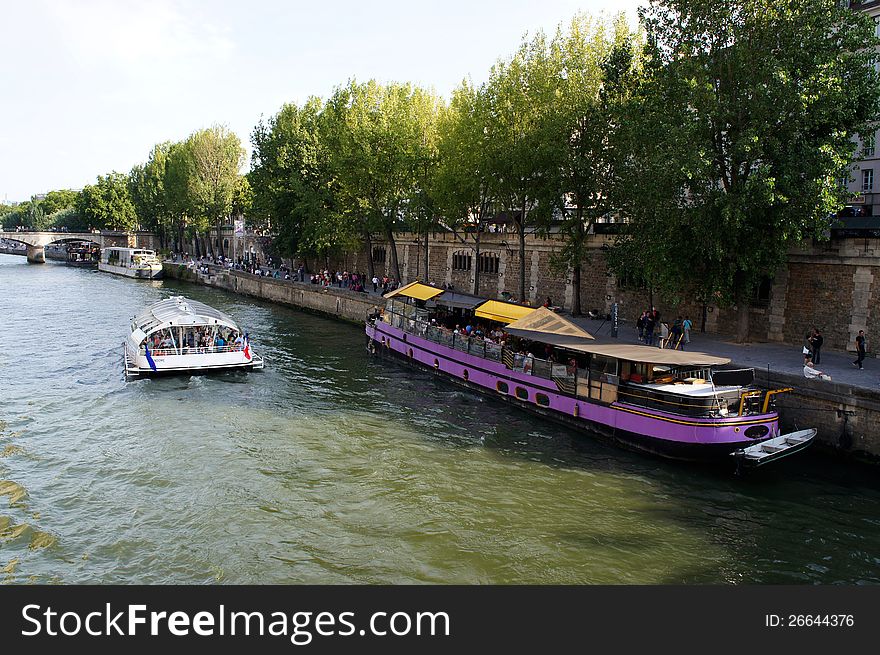 Tourist cruise boat in River Seine Paris France. Tourist cruise boat in River Seine Paris France