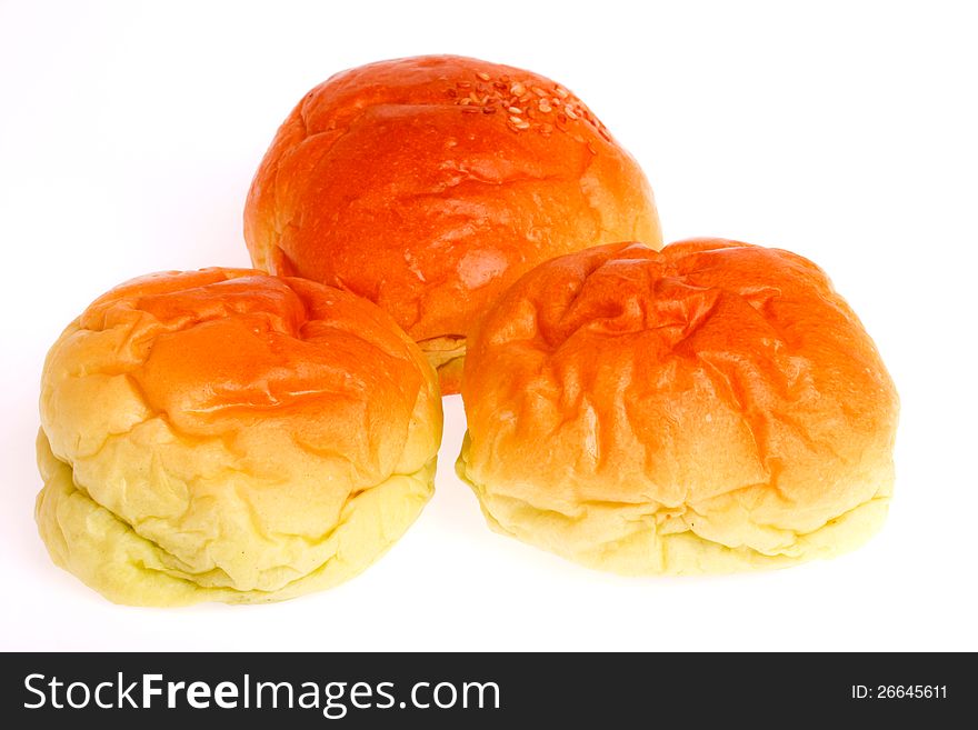 Bakery cake filled with custard cream on white background