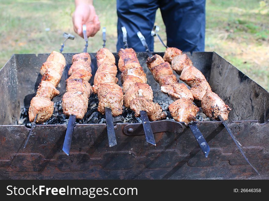 Tasty delicious fried meat on the grill. Tasty delicious fried meat on the grill