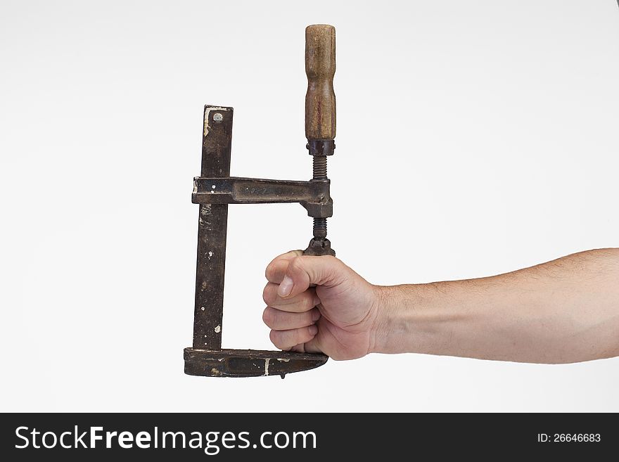 Old tool tightens hand isolated on white background