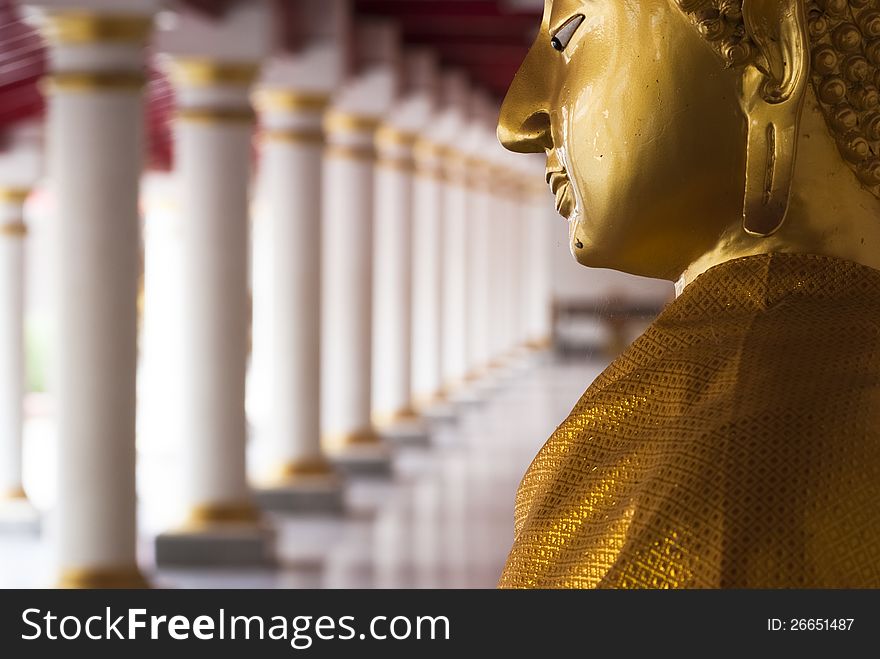 Golden buddha image in Nakornpanom Province, Thailand