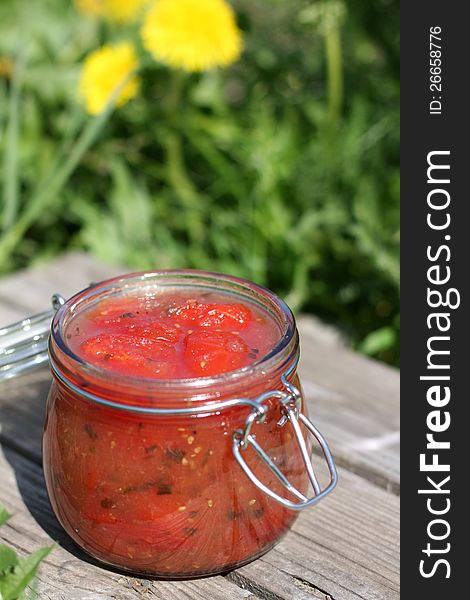 Tomato paste in glass jar