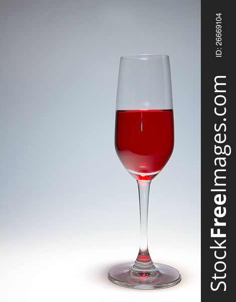 red wine glass in white background