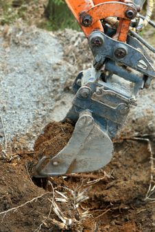 Excavator Digging Ground Stock Photo