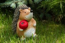 Clay Hedgehog With Red Apple Stock Photo Clay Hedgehog With Red Apple Stock Photo