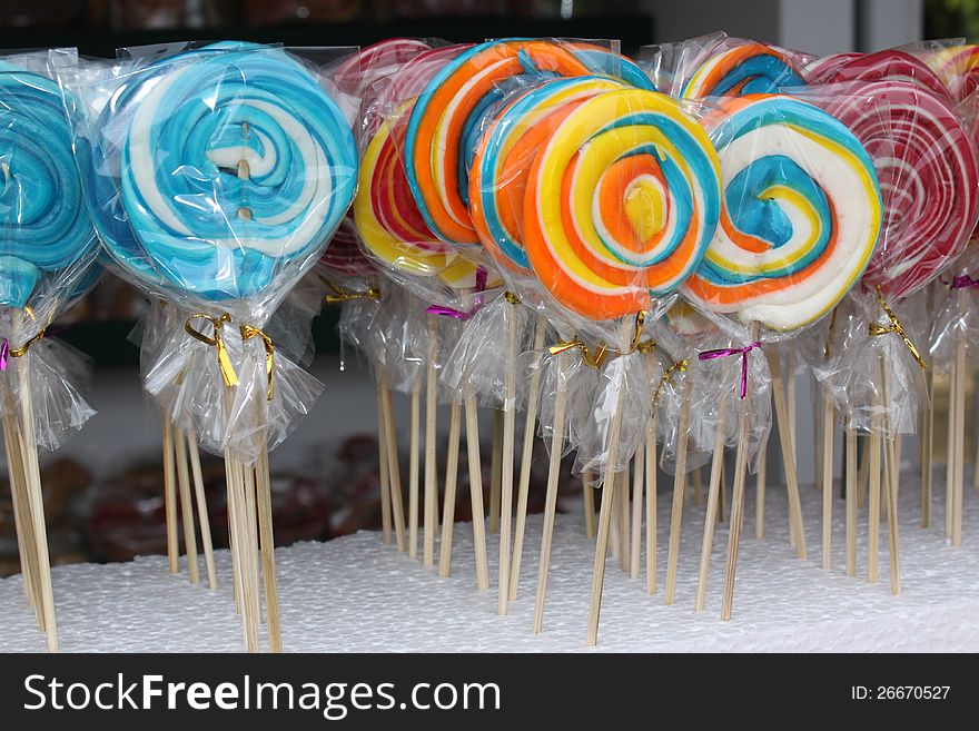 Sweet colorful lollipops exposed outdoor